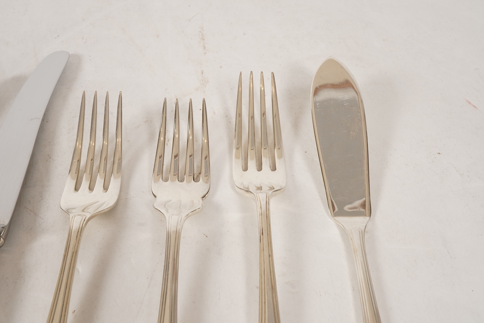 An Elizabeth II matched canteen of silver Grecian pattern cutlery for eight